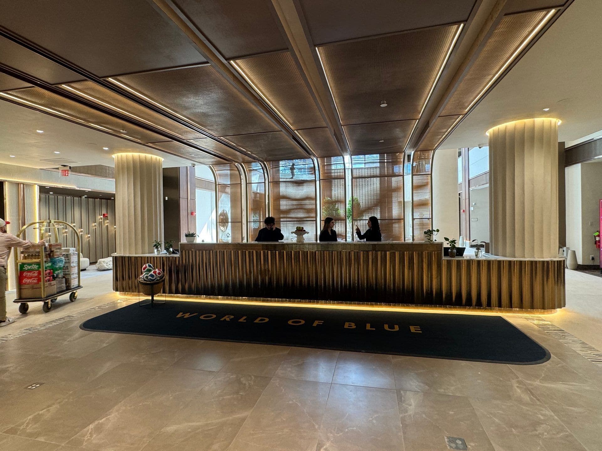 Guests checking in at the front desk